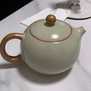 Neutral Tone Ceramic Teapot with Smooth Finish